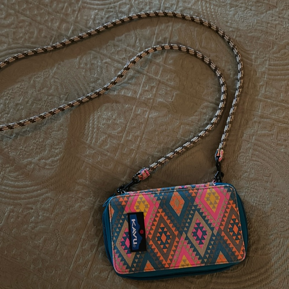 Kavu small cross body bag, small with rope  strap.orange, pink,turquoise print